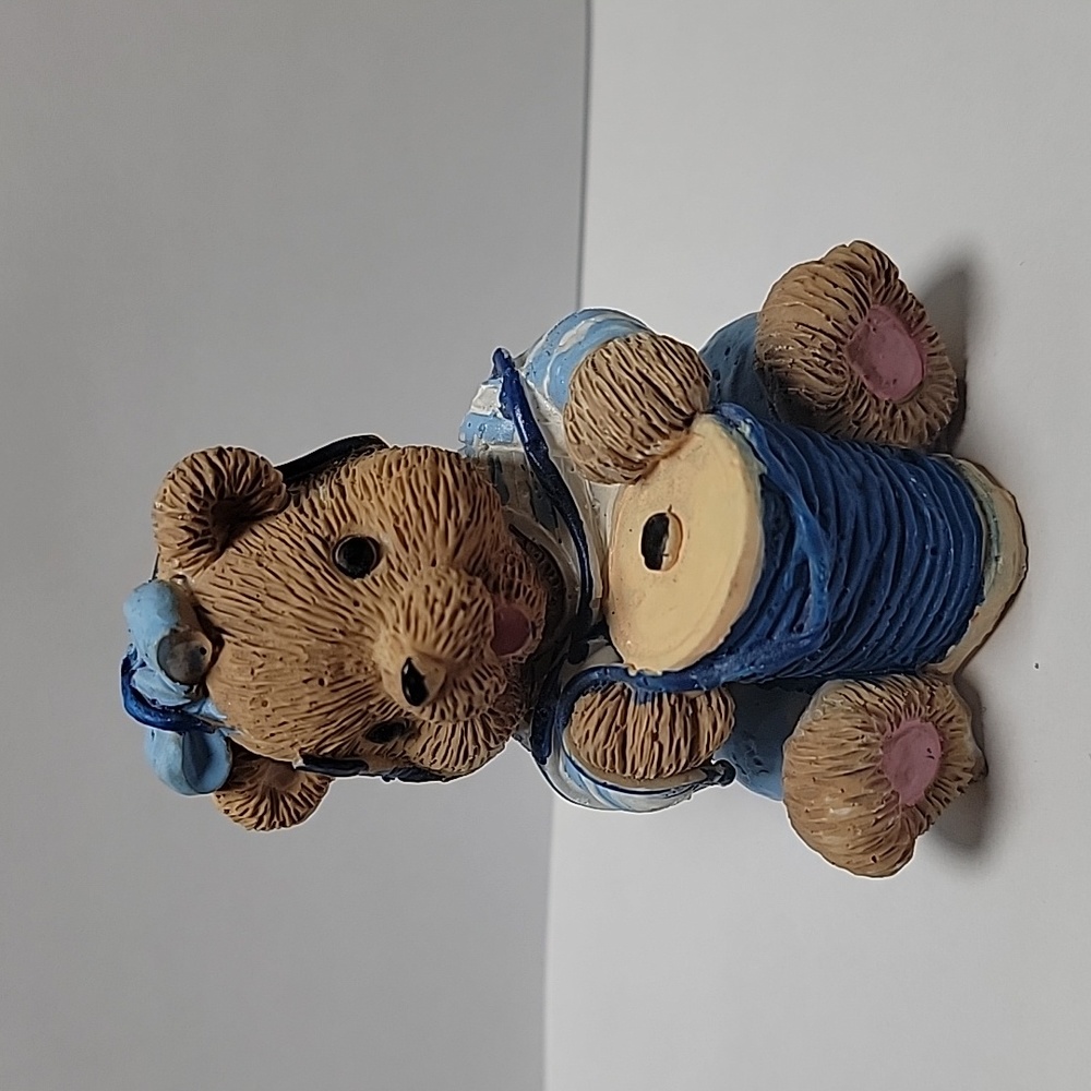 Bear with thread figurine